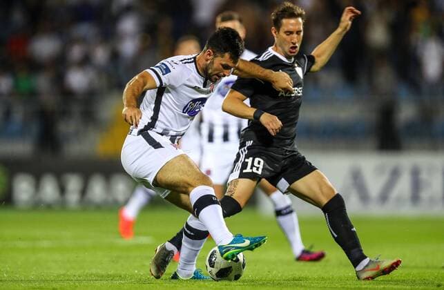UEFA Champions League Second Qualifying Round Second Leg, Dalga Arena, Baku, Azerbaijan 31 7 2019 Qarabag vs Dundalk Dundalk s Pat Hoban with Filip Ozobic of Qarabag Pat Hoban with Filip Ozobic 31 7 2018  Copyright: x©INPHO RyanxByrnex RB1_9794