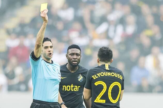 190731 Tarik Elyounoussi of AIK gets a yellow card during the UEFA Champions League qualifying match between AIK and Maribor on July 31, 2019 in Stockholm Photo Jesper Zerman BILDBYRAN Cop 234 Fotboll Football UEFA Champions League 2019 2020 Champions League qualification CL AIK Maribor,  Copyright: JESPERxZERMAN BB190731JZ017