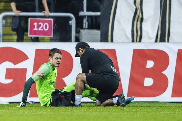 190731 Goalkeeper Oscar Linner of AIK with a possible injury during the UEFA Champions League qualifying match between AIK and Maribor on July 31, 2019 in Stockholm Photo Jesper Zerman BILDBYRAN Cop 234 Fotboll Football UEFA Champions League 2019 2020 Champions League qualification CL AIK Maribor,  Copyright: JESPERxZERMAN BB190731JZ056