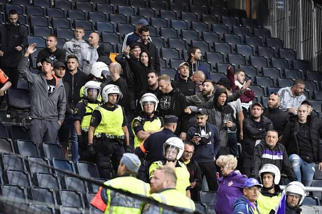 Police protect Maribor supporfters after masked AIK supporters tried to attack Maribor fans on the stands during the UEFA Champions League second qualifying round leg 2 soccer match between AIK and NK Maribor Slovenia at Friends Arena in Stockholm, Sweden, on July 31,2019 Stockholm SWEDEN SOCCER x11880x,  Copyright: xNainaxHelenxJama TTx KVAL CHAMPIONS LEAGUE AIK-MARIBOR