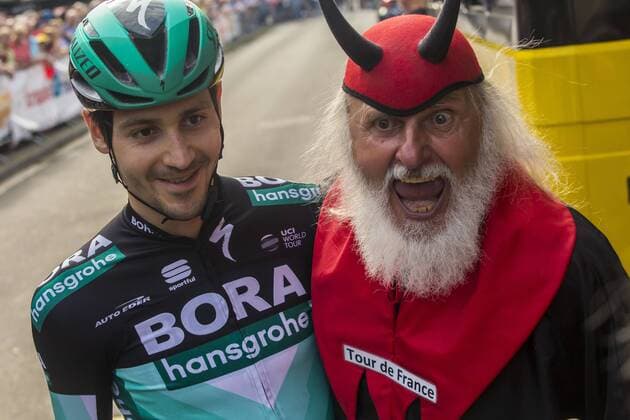 Emanuel Buchmann GER, fourth in the Tour de France 2019, left, Team Bora HansGrohe at the bike race Tour de Neuss with Tourteufel Dieter Didi Senft, right, on Wednesday, 31 July 2019 on the circuit in Neuss NRW bike race Tour de Neuss