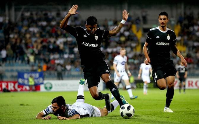 UEFA Champions League Second Qualifying Round Second Leg, Dalga Arena, Baku, Azerbaijan 31 7 2019 Qarabag vs Dundalk Qarabag s Ailton Ferreira Silva and Pat Hoban of Dundalk Ailton Ferreira Silva and Pat Hoban 31 7 2018  Copyright: x©INPHO RyanxByrnex RB2_9874