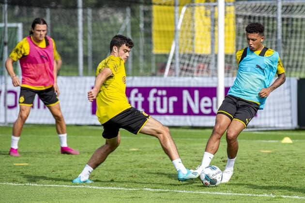 Football season 2019 2020, Borussia Dortmund training camp on 01 08 2019 in Bad Ragaz Switzerland Dortmunds Giovanni Reyna l and Dortmunds Jadon Sancho fight for the ball Copyright: xKirchner Inderliedx