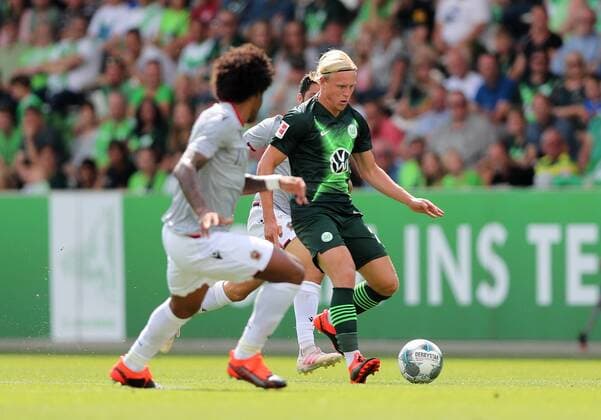 Xaver Schlager VfL Wolfsburg in duel with Dante nizza DFL REGULATIONS PROHIBIT ANY USE OF PHOTOGRAPHS AS IMAGE SEQUENCES AND OR QUASI VIDEO