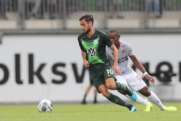 Yunus Malli VfL Wolfsburg in a duel DFL REGULATIONS PROHIBIT ANY USE OF PHOTOGRAPHS AS IMAGE SEQUENCES AND OR QUASI VIDEO