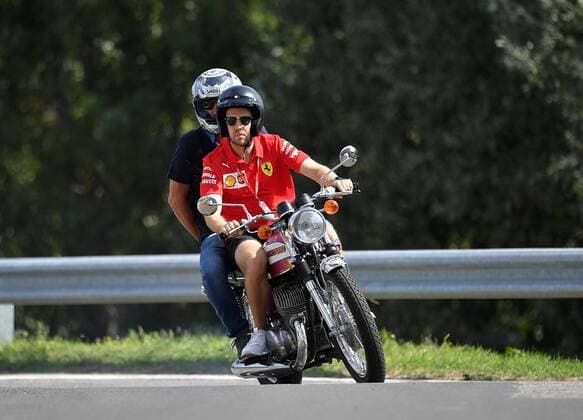 Budapest, Hungary, 04 08 2019, Formula 1, Formula 1, Hungarian Grand Prix, Sebastian Vettel GER 5 , Scuderia Ferrari Mission Winnow comes to the track Budapest Hungaroring Hungary eu images 09 506 037651 with the motorbike eu-images-506