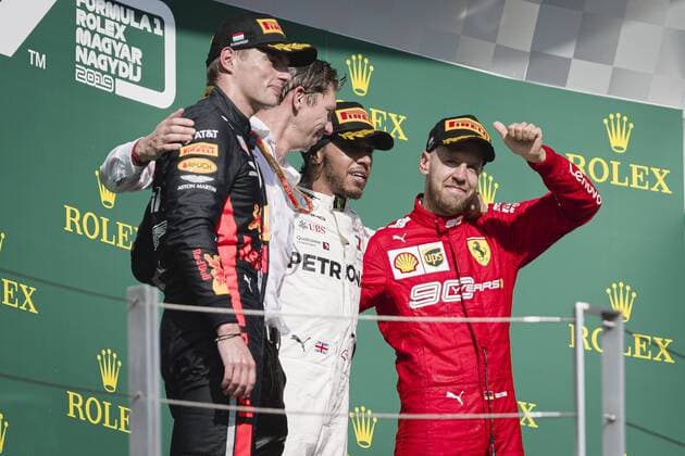 August 4, 2019, Budapest, Hungary: (From L) Red Bull Racing™s Dutch driver Max Verstappen, Mercedes AMG Petronas F1 Team™s chief strategist James Vowles, Mercedes AMG Petronas F1 Team™s British driver Lewis Hamilton and Scuderia Ferrari™s German driver Sebastian Vettel pose for photos on podium after the Hungarian F1 Grand Prix race at Hungaroring. Formula 1, Hungarian Grand Prix in Budapest, Hungary - 04 Aug 2019 - ZUMAs197 20190804_zaa_s197_119 Copyright: xJurexMakovecx