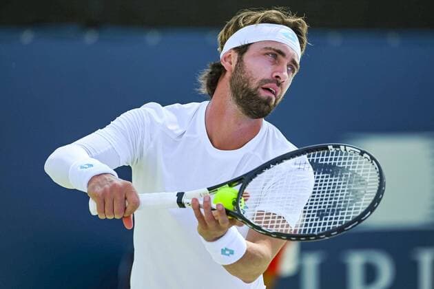 MONTREAL, QC - AUGUST 05: Nikoloz Basilashvili (GEO) serves the ball during the ATP, Tennis Herren Coupe Rogers first round match on August 5, 2019 at IGA Stadium in Montreal, QC (Photo by David Kirouac Icon Sportswire) TENNIS: AUG 05 Coupe Rogers Icon190805066