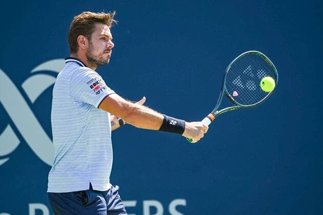 MONTREAL, QC - AUGUST 05: Stan Wawrinka (SUI) returns the ball during the ATP, Tennis Herren Coupe Rogers first round match on August 5, 2019 at IGA Stadium in Montreal, QC (Photo by David Kirouac Icon Sportswire) TENNIS: AUG 05 Coupe Rogers Icon190805068