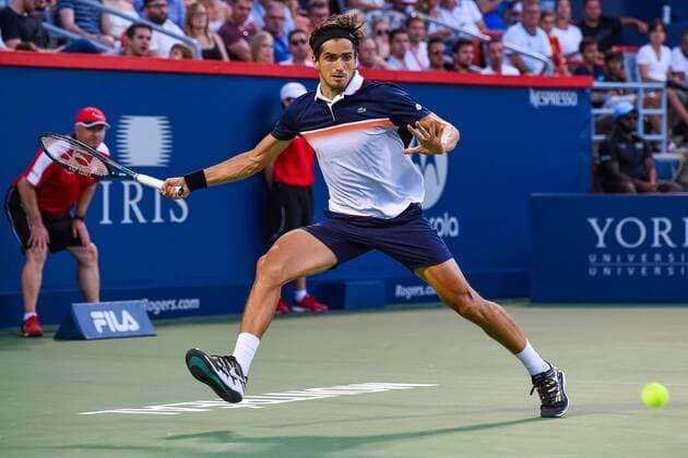 MONTREAL, QC - AUGUST 05: Pierre-Hugues Herbert (FRA) runs towards the ball to return it during the ATP, Tennis Herren Coupe Rogers first round match on August 5, 2019 at IGA Stadium in Montreal, QC (Photo by David Kirouac Icon Sportswire) TENNIS: AUG 05 Coupe Rogers Icon190805083