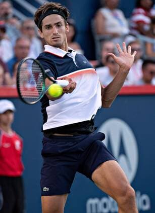 (190806) -- MONTREAL, Aug. 6, 2019 (Xinhua) -- Pierre-Hugues Herbert of France returns the ball during the first round of men s singles match against Denis Shapovalov of Canada at the 2019 Rogers Cup in Montreal, Canada, Aug. 5, 2019. (Xinhua Andrew Soong) (SP)CANADA-MONTREAL-TENNIS-ROGERS CUP-MEN S SINGLES 