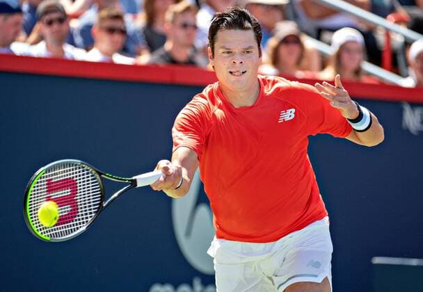 (190806) -- MONTREAL, Aug. 6, 2019 (Xinhua) -- Milos Raonic of Canada returns the ball during the first round of men s singles match against Lucas Pouille of France at the 2019 Rogers Cup in Montreal, Canada, Aug. 5, 2019. (Xinhua Andrew Soong) (SP)CANADA-MONTREAL-TENNIS-ROGERS CUP-MEN S SINGLES 