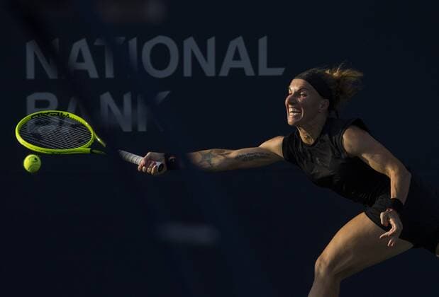 (190806) -- TORONTO, Aug. 6, 2019 -- Svetlana Kuznetsova of Russia returns the ball against Wang Xiyu of China during the first round of women s singles match at the 2019 Rogers Cup in Toronto, Canada, Aug. 5, 2019. ) (SP)CANADA-TORONTO-TENNIS-ROGERS CUP-WOMEN S SINGLES ZouxZheng 