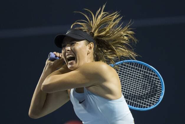 (190806) -- TORONTO, Aug. 6, 2019 -- Maria Sharapova of Russia returns the ball during the first round of women s singles match against Anett Kontaveit of Estonia at the 2019 Rogers Cup in Toronto, Canada, Aug. 5, 2019. ) (SP)CANADA-TORONTO-TENNIS-ROGERS CUP-WOMEN S SINGLES ZouxZheng 