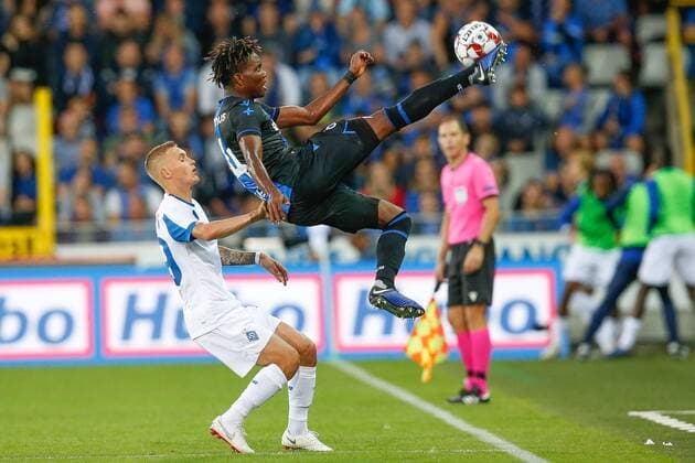 Dynamo s Vitaliy Buyalskyi and Club s David Okereke fight for the ball during a game between Belgian soccer team Club Brugge and Ukrainian club Dynamo Kyiv, in the third qualifying round of the UEFA Champions League competition, Tuesday 06 August 2019 in Brugge. BRUNOxFAHY  x05639457x