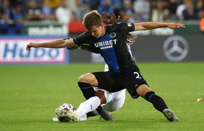Club s Eduard Sobol and Dynamo s Gerson Rodrigues fight for the ball during a game between Belgian soccer team Club Brugge and Ukrainian club Dynamo Kyiv, in the third qualifying round of the UEFA Champions League competition, Tuesday 06 August 2019 in Brugge. VIRGINIExLEFOUR  x05639488x