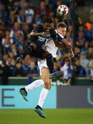 Club s David Okereke and Dynamo s Serhiy Sydorchuk fight for the ball during a game between Belgian soccer team Club Brugge and Ukrainian club Dynamo Kyiv, in the third qualifying round of the UEFA Champions League competition, Tuesday 06 August 2019 in Brugge. VIRGINIExLEFOUR x05639504x