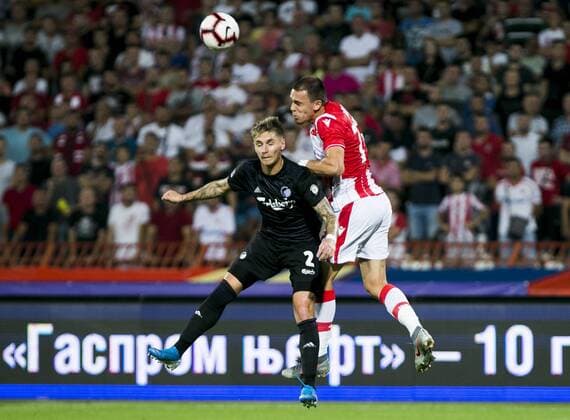 6th August 2019; Rajko Mitic Stadium, Belgrade, Serbia; UEFA Champions League Qualifying Third Leg First Round Red Star Belgrade versus FC Copenhagen; Rodic of Red Star Belgrade wins the clearing header against Varela of FC Copenhagen - Editorial Use  ActionPlus12158428 NikolaxKrstic