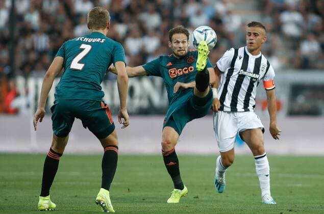 (190807) -- THESSALONIKI, Aug. 7, 2019 -- PAOK s Dimitris Pelkas (R) vies with Ajax s Daley Blind(C) during the first leg of third qualifying round match of UEFA Champions League between PAOK Thessaloniki and Ajax at Toumpa Stadium in Thessaloniki, Greece, on Aug. 6, 2019. ) (SP)GREECE-THESSALONIKI-SOCCER-UEFA CHAMPIONS LEAGUE-PAOK VS AJAX DimitrisxTosidis 