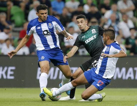 KRASNODAR, RUSSIA - AUGUST 7, 2019: Porto s Tiquinho, Krasnodar s Younes Namli, and Porto s Jesus Corona (L-R) struggle for the ball in the 2019 20 UEFA Champions League third qualifying round match between FC Krasnodar and FC Porto at Krasnodar Stadium. Valery Matytsin TASS  TS0B5B39