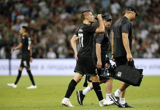 KRASNODAR, RUSSIA - AUGUST 7, 2019: Krasnodar s injured Ruslan Kambolov (C) leaves the pitch in the 2019 20 UEFA Champions League third qualifying round match between FC Krasnodar and FC Porto at Krasnodar Stadium. Valery Matytsin TASS  TS0B5B45
