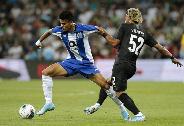 KRASNODAR, RUSSIA - AUGUST 7, 2019: Porto s Luis Diaz (L) and Krasnodar s Tonny Vilhena struggle for the ball in the 2019 20 UEFA Champions League third qualifying round match between FC Krasnodar and FC Porto at Krasnodar Stadium. Valery Matytsin TASS  TS0B5B4C
