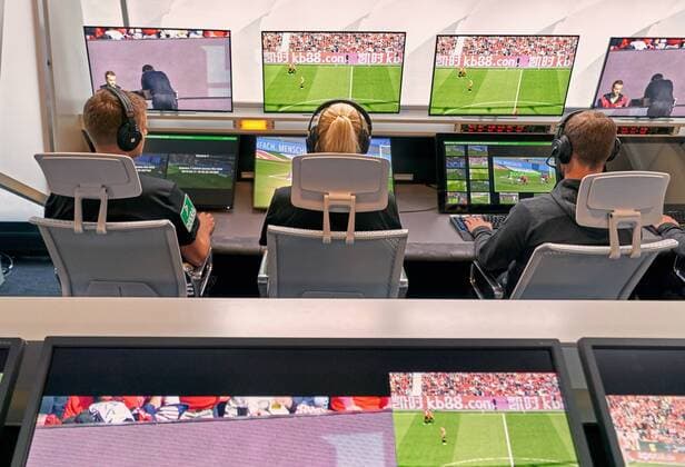 DFB referee Bibiana STEINHAUS re and her colleague Thorben SIEWER li watch scenes of a DFL Bundesliga football match on the monitors of the redesigned and expanded Video Assist Center VAC at the Cologne Broadcasting Center in Cologne together with the video operators in Cologne, August 05, 2019, Season 2019 2020. Photographer: Rene Schiffer Peter Schatz Photography