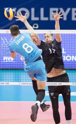 (190809) -- NINGBO, Aug. 9, 2019 -- Agustin Loser (L) of Argentina competes during the men s Pool F match between Argentina and Canada at the 2019 FIVB Tokyo Volleyball Qualification in Ningbo, east China s Zhejiang Province, Aug. 9, 2019. ) (SP)CHINA-NINGBO-FIVB-TOKYO VOLLEYBALL QUALIFICATION-CAN VS ARG(CN) WengxXinyang 