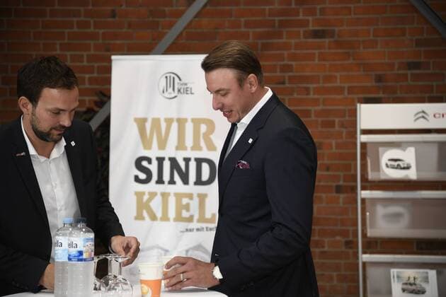 Viktor Szilagyi Managing Director Sports with THW Trainer Filip Jicha, Handball, Men, THW Kiel, Bundesliga, Press Conference, 13 08 19 Kiel Showroom Süverkrup Schleswig Holstein Germany
