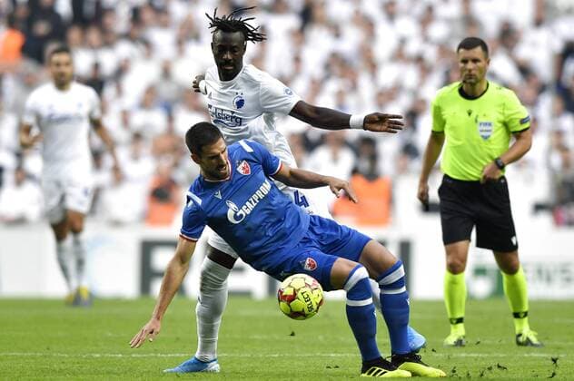 Dame N Doye, FC Copenhagen th and Milos Degenek, Roede Stjerne fight for the ball in the Champions League qualifier match between FC Koebenhavn and Roede Stjerne in the Park in Copenhagen on Tuesday, August 13, 2019, Denmark,  Copyright: AndersxKjaerbye xRitzauxScanpixx COP101 spdk20190813-202659-L