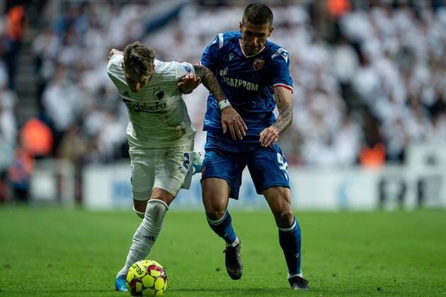 FC Copenhagens Guillermo Varela in match with Red Stars Aleksa Vukanovic during the Champions League qualifiers match between FC Copenhagen and Red Stars in the Park in Copenhagen, Tuesday 13 August 2019, Copenhagen Denmark,  Copyright: Scanpix NielsxChristianxVilmannx COP101 spdk20190813-210007-L