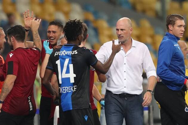 Club s David Okereke and Club Brugge s head coach Philippe Clement celebrate after winning a soccer game between Ukrainian club Dynamo Kyiv and Belgian team Club Brugge KV, Tuesday 13 August 2019 in Kyiv, Ukraine, the return match in the third qualifying round of the UEFA Champions League. Club won the first leg 1-0. BRUNOxFAHY  x05642895x
