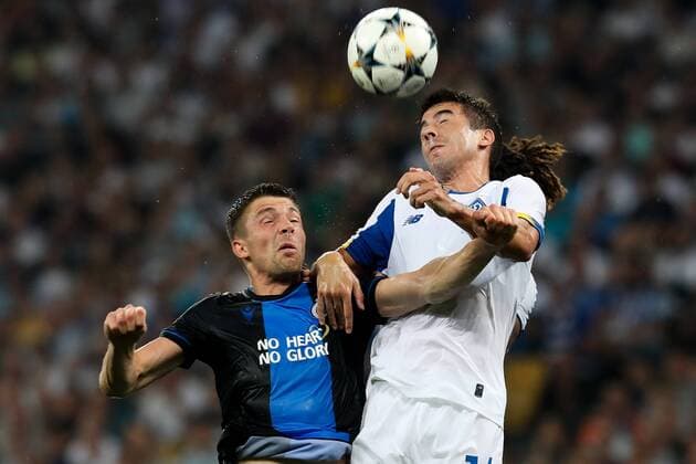 Club s Brandon Mechele and Dynamo s Carlos Maria de Pena Bonino fight for the ball during a soccer game between Ukrainian club Dynamo Kyiv and Belgian team Club Brugge KV, Tuesday 13 August 2019 in Kyiv, Ukraine, the return match in the third qualifying round of the UEFA Champions League. Club won the first leg 1-0. BRUNOxFAHY  x05642881x