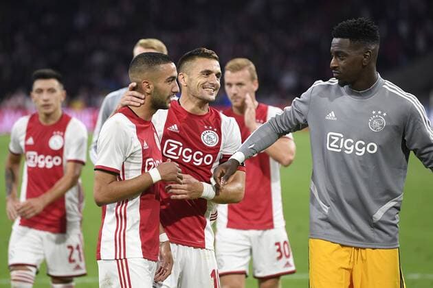 AMSTERDAM , 13-08-2019 , Johan Cruijff ArenA , Champions League third qualifying round season 2019-2020 , Ajax player Hakim Ziyech , Ajax player Dusan Tadic and Ajax goalkeeper Bruno Varela during the match Ajax - PAOK Ajax - PAOK  x4105893x Copyright: