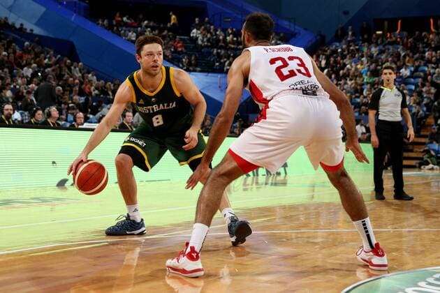BASKETBALL AUSTRALIA CANADA, Matthew Dellavedova (left) of the Boomers faces Phil Scrubb of Canada during the first Australia v Canada basketball match at RAC Arena in Perth, Friday, August 16, 2019. ( NO ARCHIVING, EDITORIAL USE ONLY, NO USE IN BOOKS WITHOUT CONSENT PERTH WA AUSTRALIA  Copyright: xRICHARDxWAINWRIGHTx 20190816001413553926
