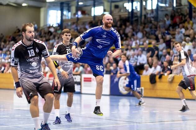 Alexander Becker No 45, VfL Gummersbach vs. Martin Waschul No 18, VfL Luebeck Schwartau and Janik Schrader No 23, VfL Luebeck Schwartau VfL Gummersbach vs. VfL Luebeck Schwartau, Handball, DHB Cup, 17 08 19 Luebeck Schleswig Holstein Germany Copyright: xAgentur54Gradx xFelixxKoenigx