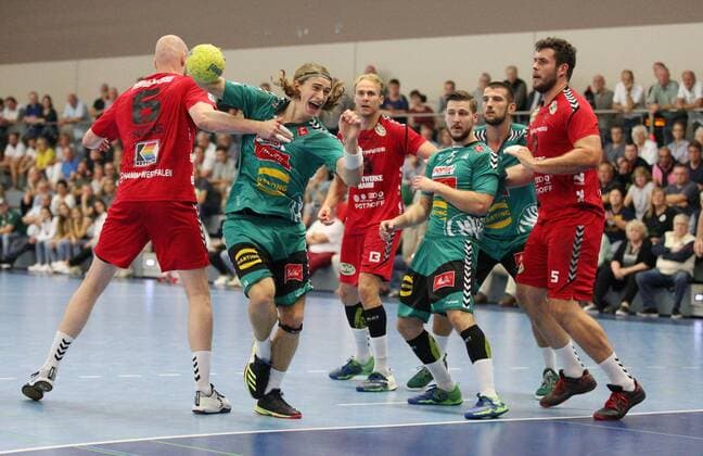 Juri Knorr TSV GWD Minden 19 against Markus Fuchs ASV Hamm Westfalen 6 left GER, Handball, DHB Cup, 1 Round, Semifinal 2, TSV GWD Minden against ASV Hamm Westfalen, 17 08 2019 Minden Copyright: xEIBNER JanxStrohdiekx EP_JSK