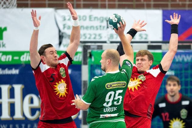 Spenge, Germany 18 08 2019 DHB Cup 1 Main Round 2019 2020 TuS N Lübbecke vs Foxes Berlin L R Jo Gerrit Genz Lübbecke , Paul Drux Berlin , Patryk Walczak Lübbecke Spenge Nordrhein Westfalen Germany Aqua Magica
