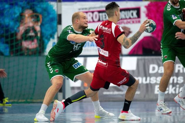Spenge, Germany 18 08 2019 DHB Cup 1 Main Round 2019 2020 TuS N Lübbecke vs Füchse Berlin L R Paul Drux Berlin , Roman Becvar Lübbecke Spenge Nordrhein Westfalen Germany