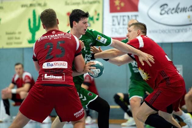 Spenge, Germany 18 08 2019 DHB Cup 1 Main Round 2019 2020 TuS N Lübbecke vs Füchse Berlin L R Moritz Schade Lübbecke , Simon Ernst Berlin , Lukasz Gierak Lübbecke Spenge Nordrhein Westfalen Germany
