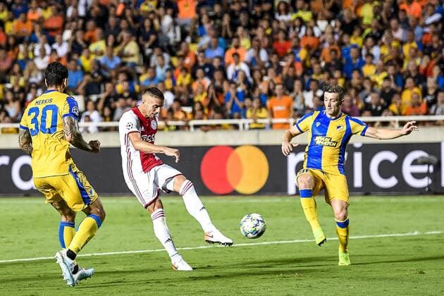 NICOSIA , 20-08-2019 , GSP Stadium , Champions League playoff, season 2019-2020 , APOEL Nicosia player Giorgos Merkis, Ajax player Dusan Tadic , APOEL Nicosia player Dragan Mihajlovic during the match APOEL Nicosia - Ajax APOEL Nicosia - Ajax  x4149631x Copyright: