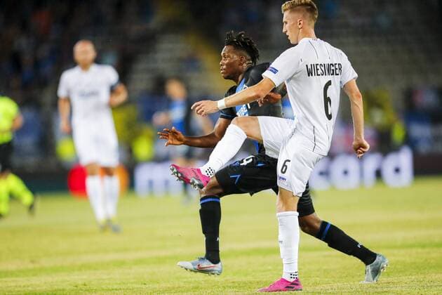SOCCER - CL, play off, LASK vs Bruegge LINZ,AUSTRIA,20.AUG.19 - SOCCER - UEFA Champions League, play off, LASK vs FC Bruegge. Image shows Emmanuel B. Dennis (Bruegge) and Philipp Wiesinger (LASK). GEPAxpictures xJasminxWalter