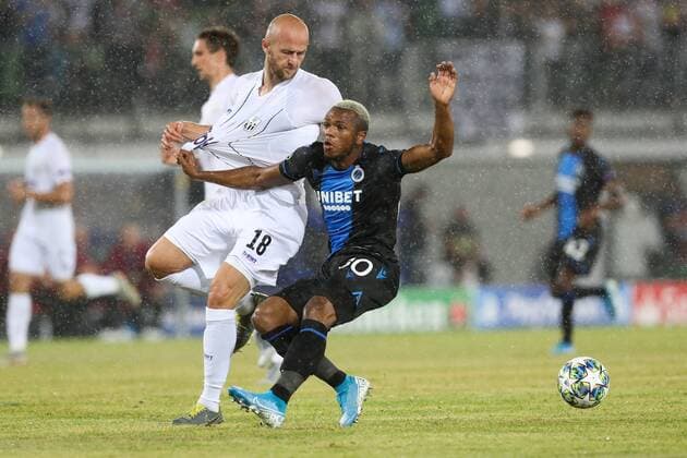 LASK s Gernot Trauner and Club s Lois Openda fight for the ball during the match of Belgian soccer team Club Brugge KV against Austrian team LASK Linz in the first leg of the play-offs for the UEFA Champions League, in Linz, Austria, Tuesday 20 August 2019. BRUNOxFAHY  x05646303x