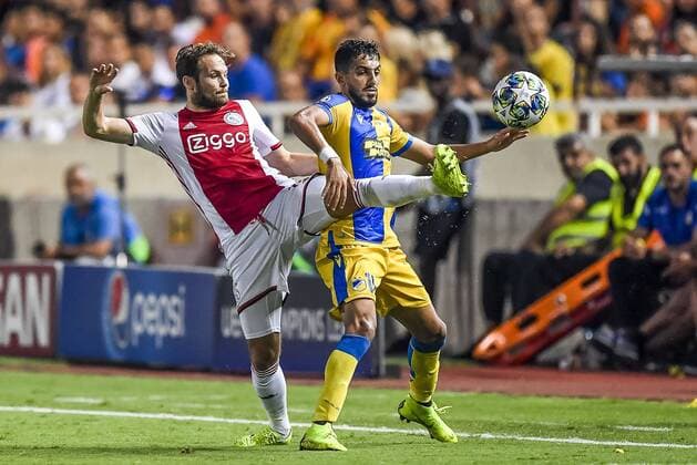 NICOSIA , 20-08-2019 , GSP Stadium , Champions League playoff, season 2019-2020 , Ajax player Daley Blind, APOEL Nicosia player Musa Suleiman during the match APOEL Nicosia - Ajax APOEL Nicosia - Ajax  x4149885x Copyright:
