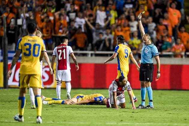 NICOSIA , 20-08-2019 , GSP Stadium , Champions League playoff, season 2019-2020 , referee Antonio Mateu Lahoz gives Ajax player Noussair Mazraoui 2nd yellow card during the match APOEL Nicosia - Ajax APOEL Nicosia - Ajax  x4149901x Copyright: