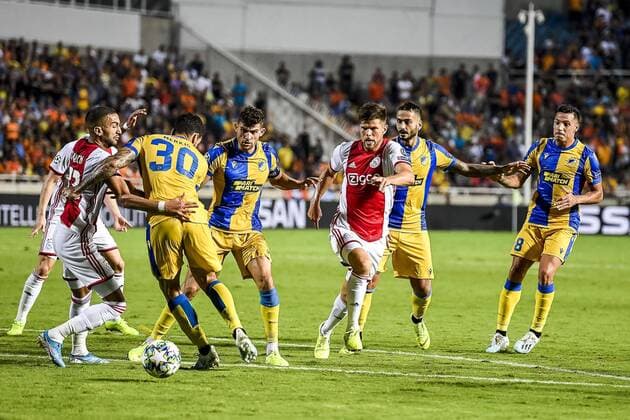 NICOSIA , 20-08-2019 , GSP Stadium , Champions League playoff, season 2019-2020 , Ajax player Donny van de Beek, APOEL Nicosia player Nicholas Ioannou, APOEL Nicosia player Giorgos Merkis, Ajax player Hakim Ziyech, Ajax player Klaas Jan Huntelaar during the match APOEL Nicosia - Ajax APOEL Nicosia - Ajax  x4150004x Copyright: