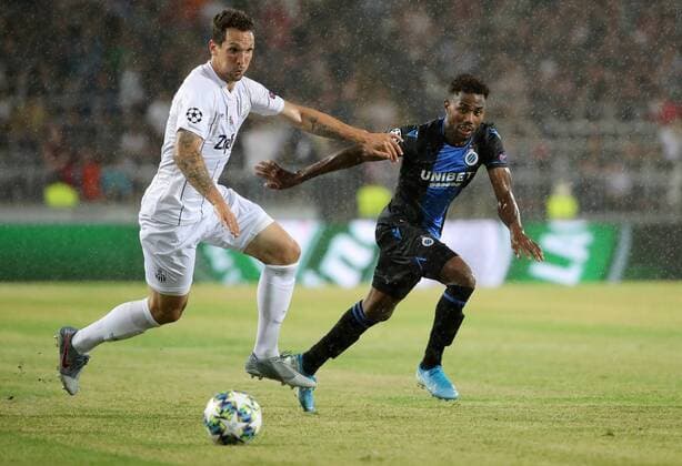 SOCCER - CL, play off, LASK vs Bruegge LINZ,AUSTRIA,20.AUG.19 - SOCCER - UEFA Champions League, play off, LASK vs FC Bruegge. Image shows Emanuel Pogatetz (LASK) and Emmanuel Bonaventure (Bruegge). GEPAxpictures xWalterxLuger