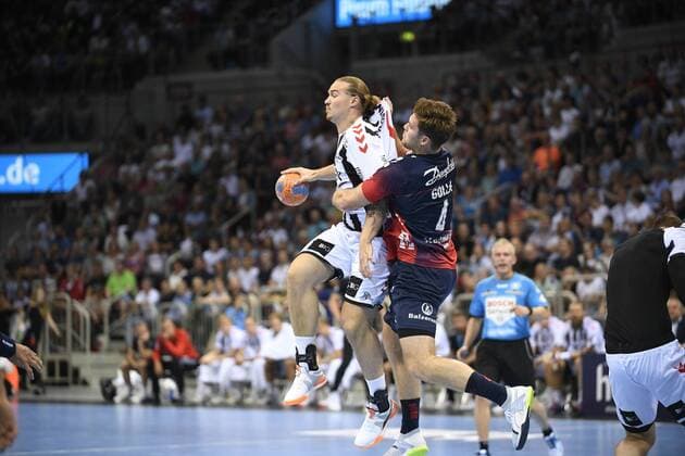 Johannes Golla SG Flensburg Handewitt against Lukas Nilsson THW Kiel , Handball, Men, Super Cup, THW Kiel vs. SG Flensburg Handewitt, Season 2019 2020, 21 08 19 Düsseldorf ISS Dome Nordrhein Westfalen Germany