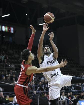 2st August 2019; Quay Centre, Sydney, Australia; International Basketball, Canada versus New Zealand Tall Blacks; Corey Webster of New Zealand takes a shot as Andrew Nembhard of Canada challenges - Editorial Use Only.  ActionPlus12161599 NigelxOwen