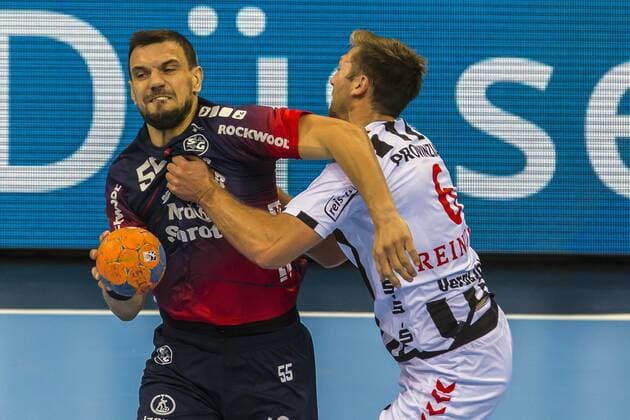 Handball Pixum Supercup SG Flensburg Handewitt against THW Kiel on Wednesday, 21 August 2019 in the ISS Dome in Düsseldorf Harald Reinkind Kiel , right, in the duel against Michal Jurecki Flensburg Handewitt Pixum Handball Supercup 2019
